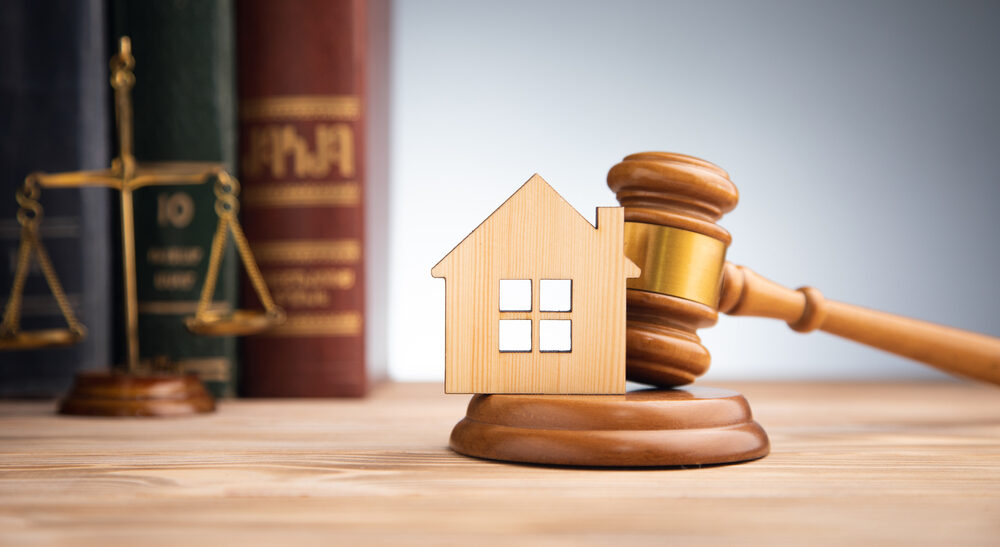 judge,auction,and,real,estate,concept.,house,model,,gavel,and